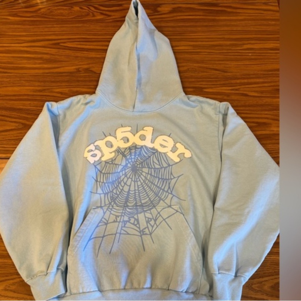 Light Blue Hoodie with Spider Web Design